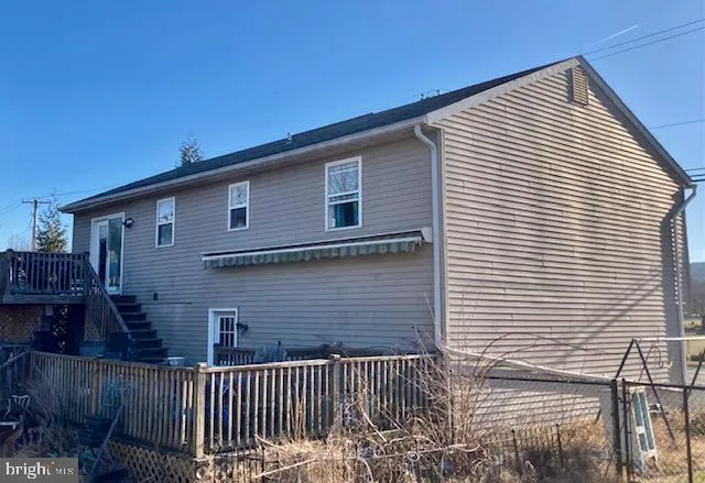 a view of a house with a deck