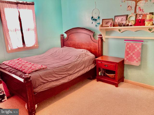 1329 Sheep Hill Road East Earl, PA 17519 - Photo 8 of 15 a bedroom with a bed and a dresser