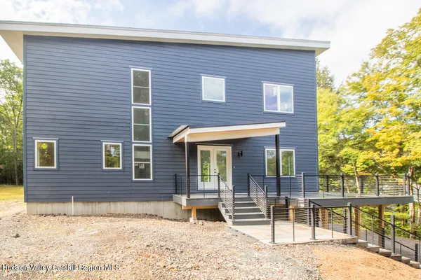 a front view of a house with a patio