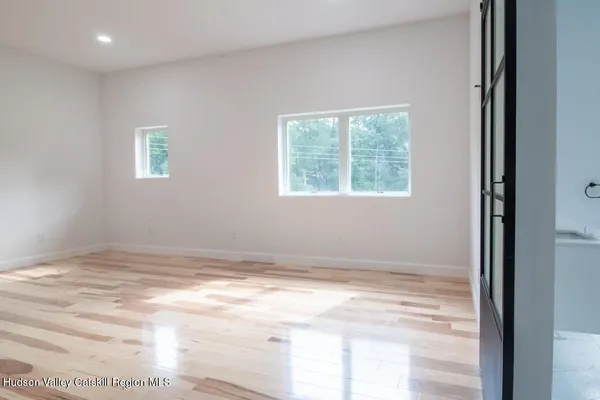 a bathroom with a bathtub and shower