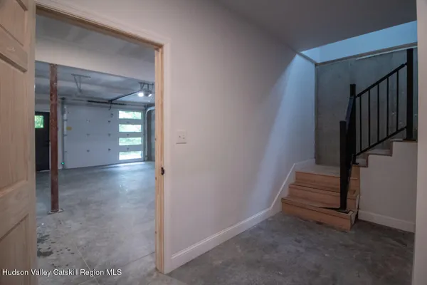 a aerial view of a house with a yard