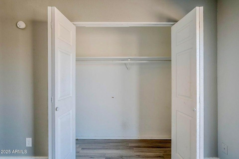1826 N Spring, Unit 201 Mesa, AZ 85203 - Photo 15 of 17 a view of an empty walk in closet
