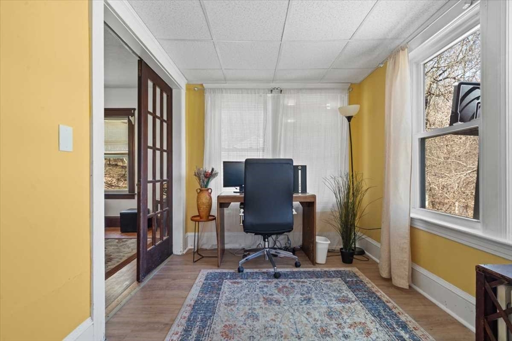 18 Joppa Road Worcester, MA 01602 - Photo 16 of 29 a view of a workspace with furniture and a window