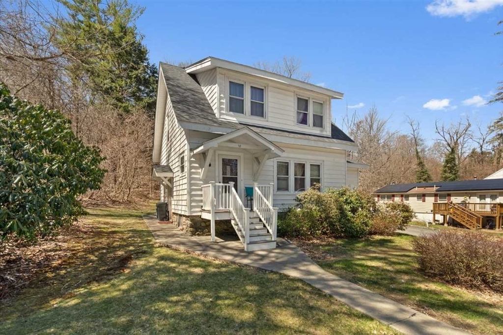 18 Joppa Road Worcester, MA 01602 - Photo 2 of 29 a front view of a house with a yard