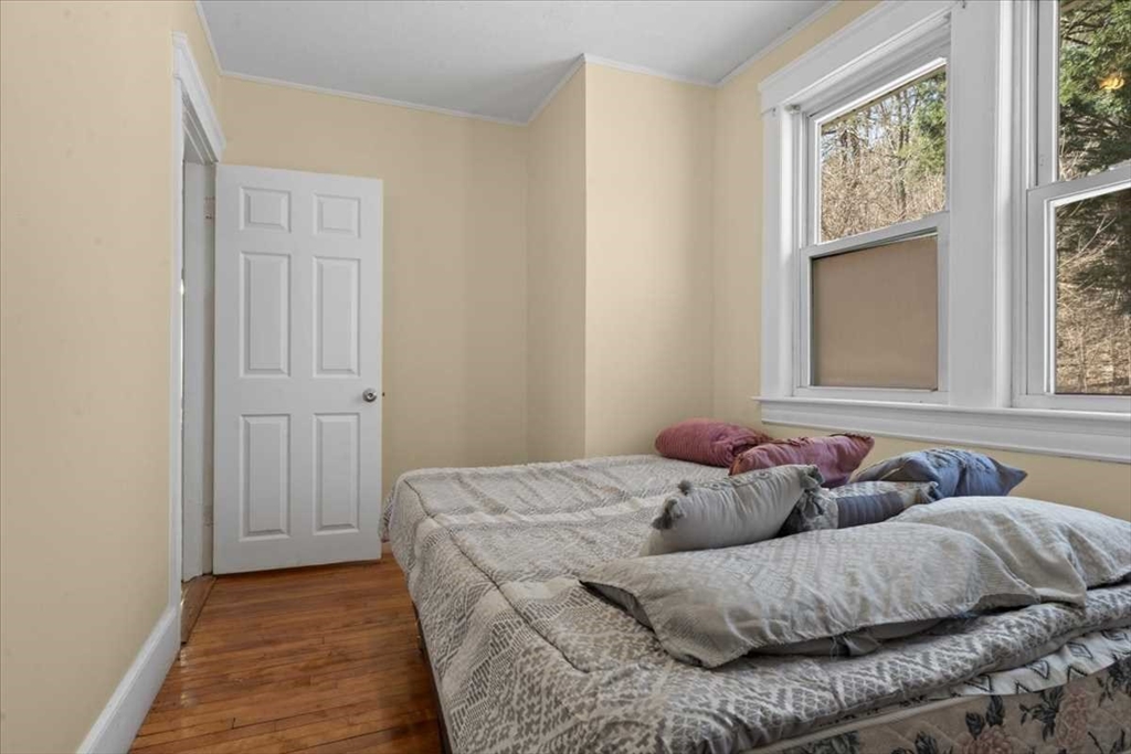 18 Joppa Road Worcester, MA 01602 - Photo 21 of 29 a living room with a couch and a window