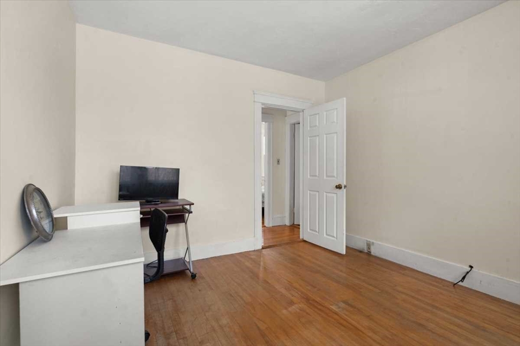 18 Joppa Road Worcester, MA 01602 - Photo 24 of 29 a view of a workspace with furniture and wooden floor