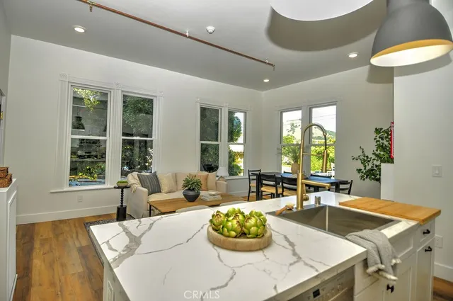 a living room with furniture and a rug