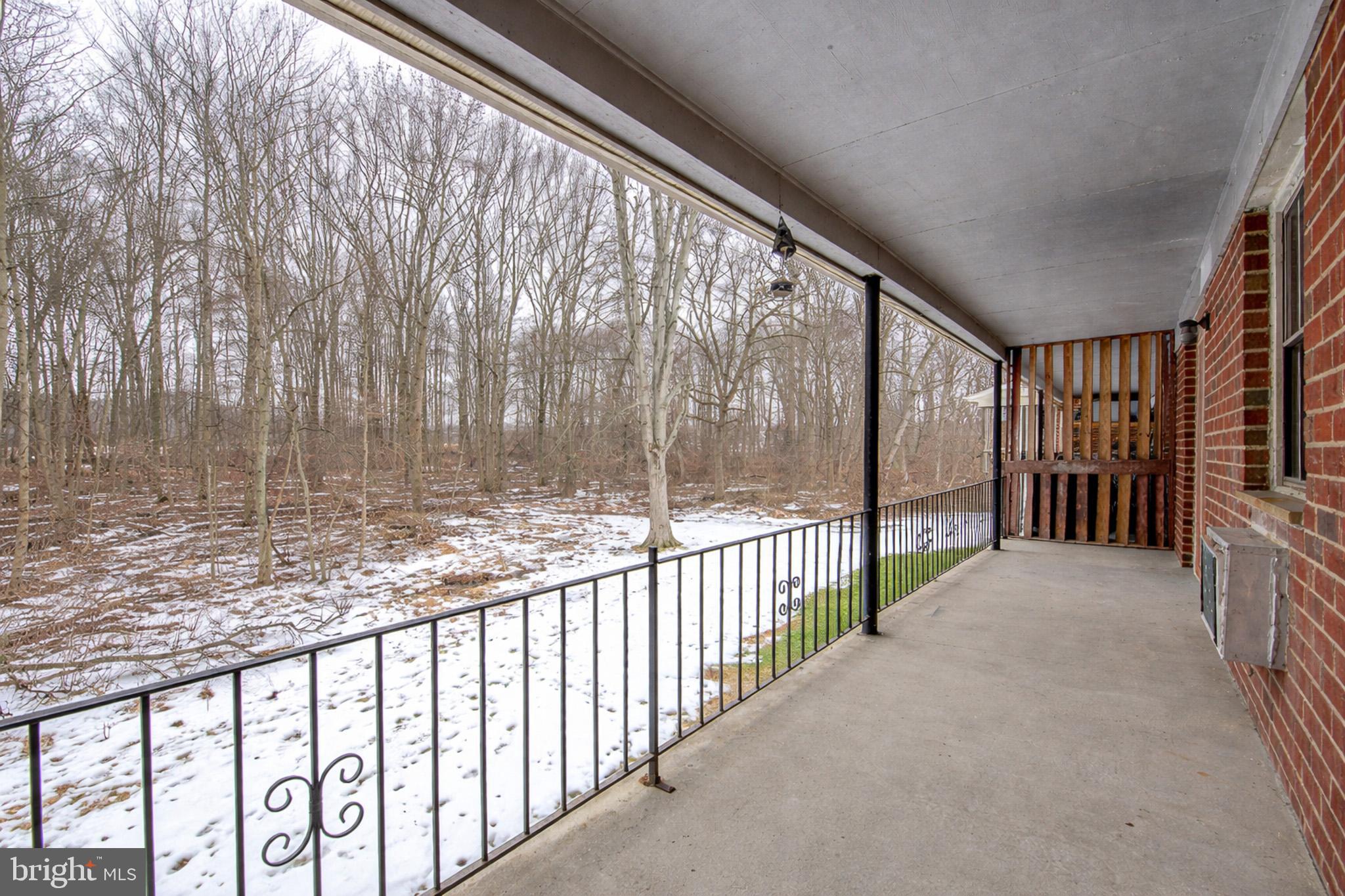 20 Fort Sumpter Road, Unit D10 Pennsville, NJ 08070 - Photo 2 of 9 a view of porch with green space