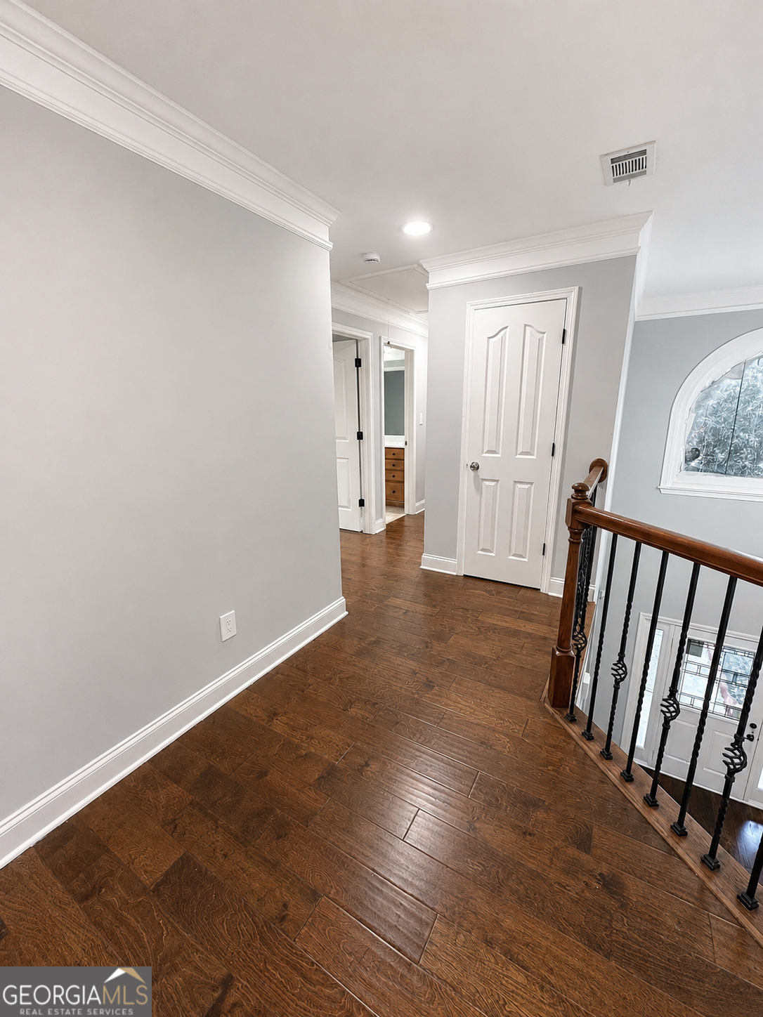 2614 Dolostone Way Dacula, GA 30019 - Photo 15 of 29 a view of a hallway with wooden floor