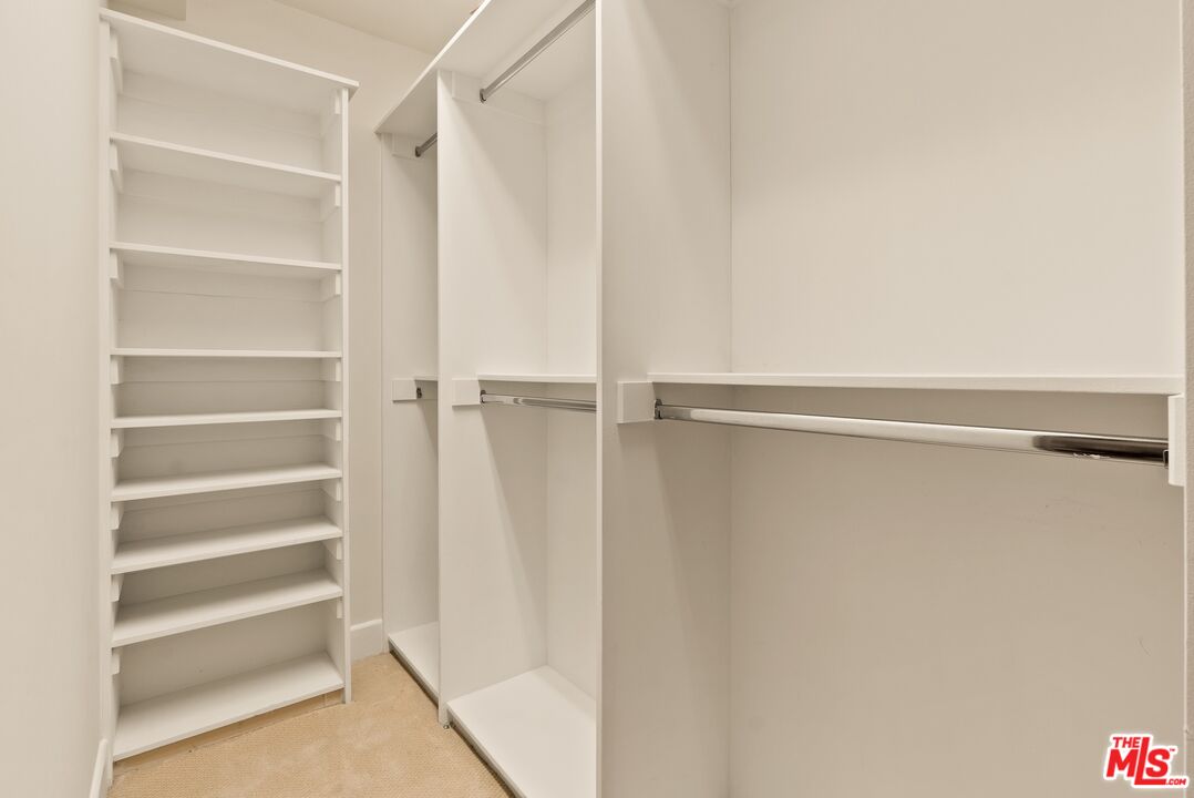 3971 Moore Street, Unit 102 Los Angeles, CA 90066 - Photo 21 of 35 a view of walk in closet with empty racks