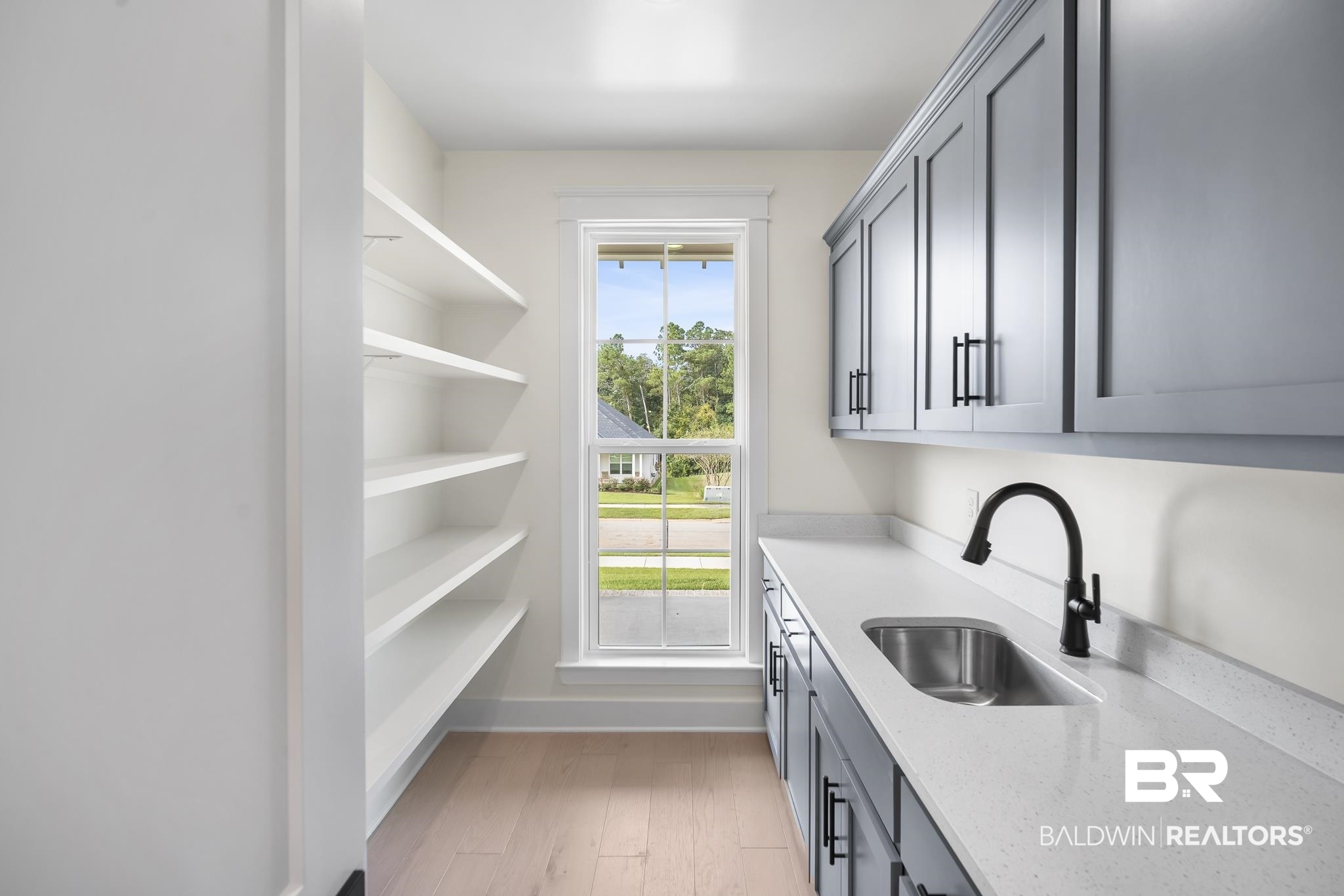 21826 Veranda Boulevard Fairhope, AL 36532 - Photo 14 of 42 Messy Kitchen area featuring a sink