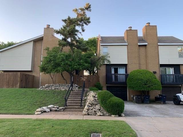 2236 Irwin Street Fort Worth, TX 76110 - Photo 1 of 9 a front view of a house with garden