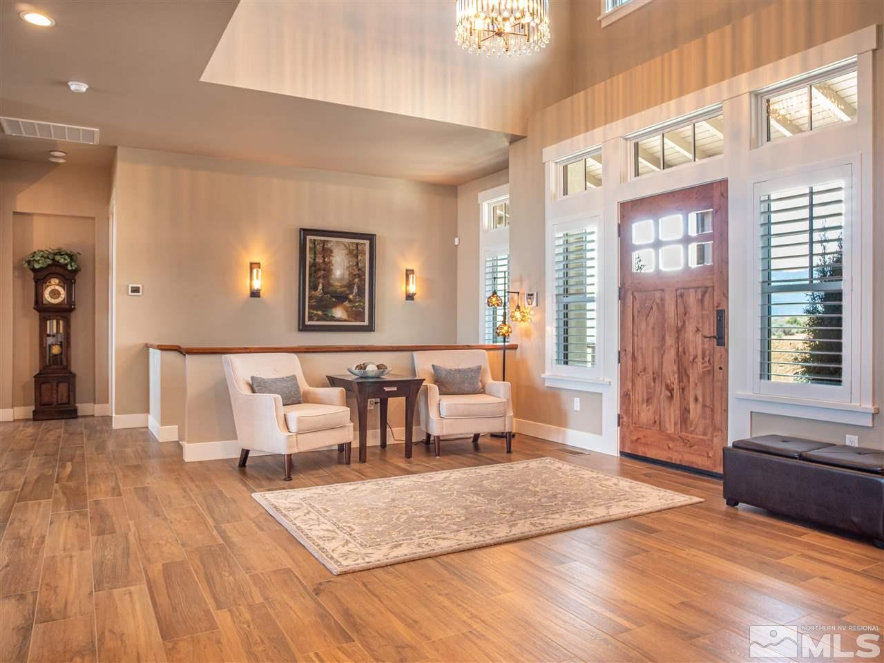 1690 Circle Stone Court Reno, NV 89523 - Photo 14 of 40 a living room with furniture and wooden floor