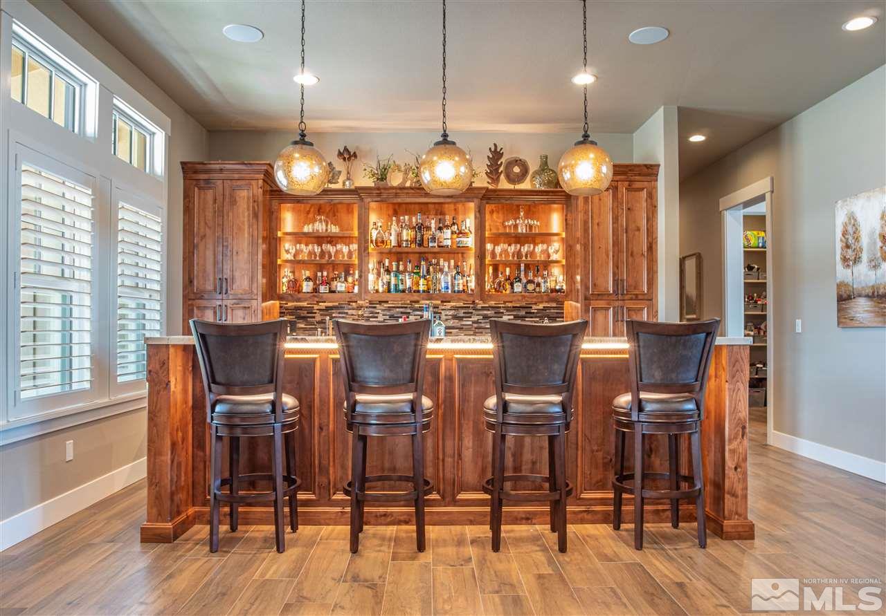 1690 Circle Stone Court Reno, NV 89523 - Photo 16 of 40 a view of a dining room with furniture window and wooden floor