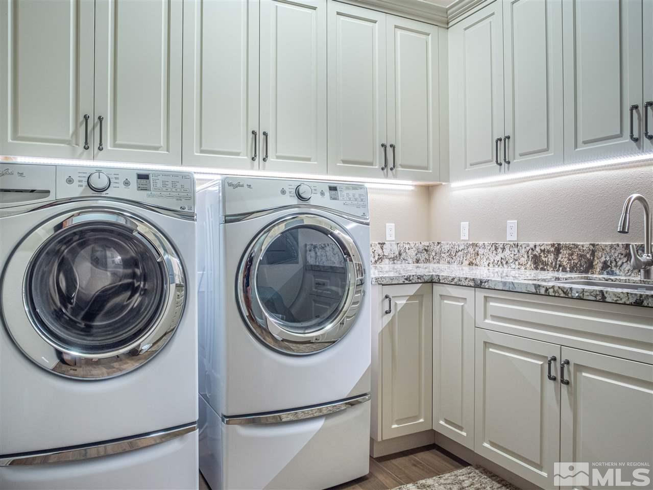 1690 Circle Stone Court Reno, NV 89523 - Photo 22 of 40 a utility room with sink dryer and washer