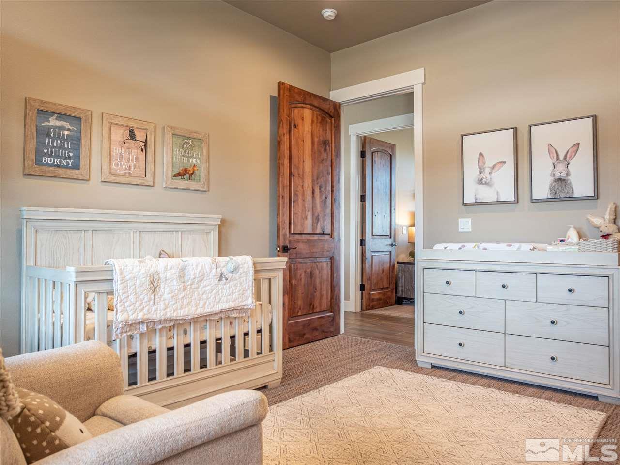 1690 Circle Stone Court Reno, NV 89523 - Photo 25 of 40 a bedroom with furniture and a window