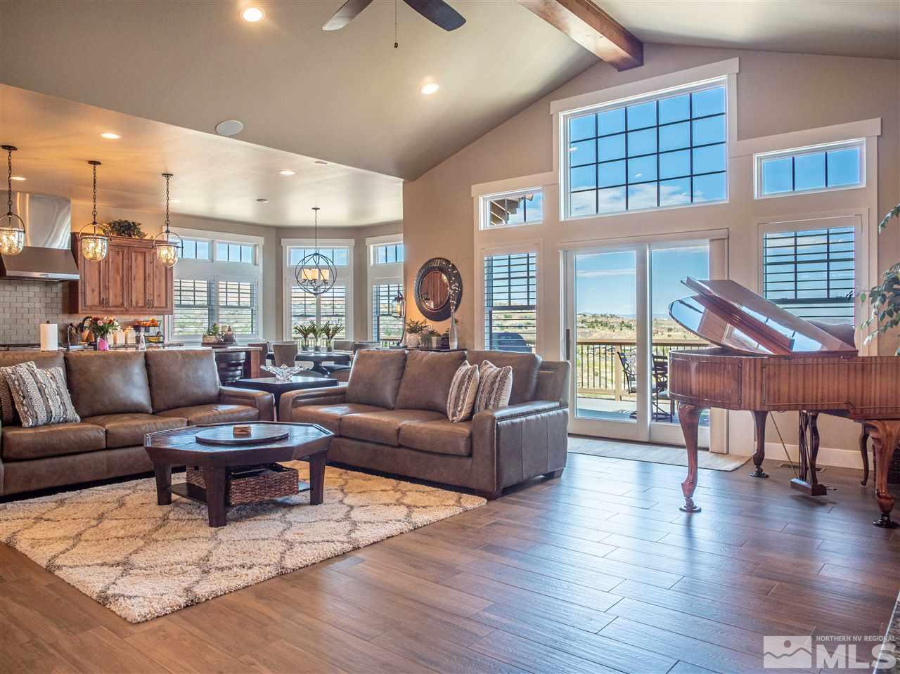 1690 Circle Stone Court Reno, NV 89523 - Photo 5 of 40 a living room with furniture and a large window
