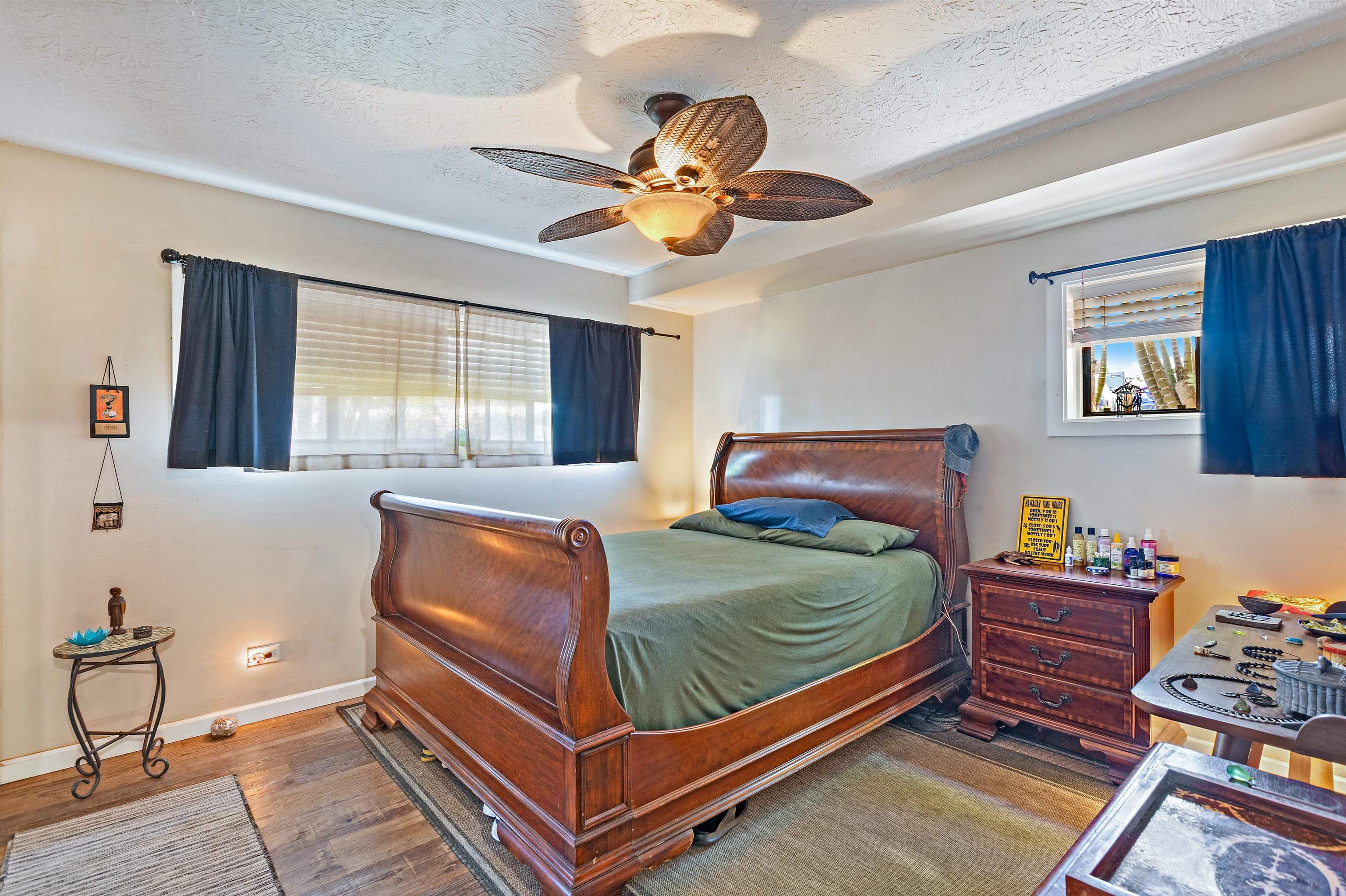 3788 Lower Honoapiilani Road, Unit D101 Lahaina, HI 96761 - Photo 16 of 40 a bedroom with a bed and window