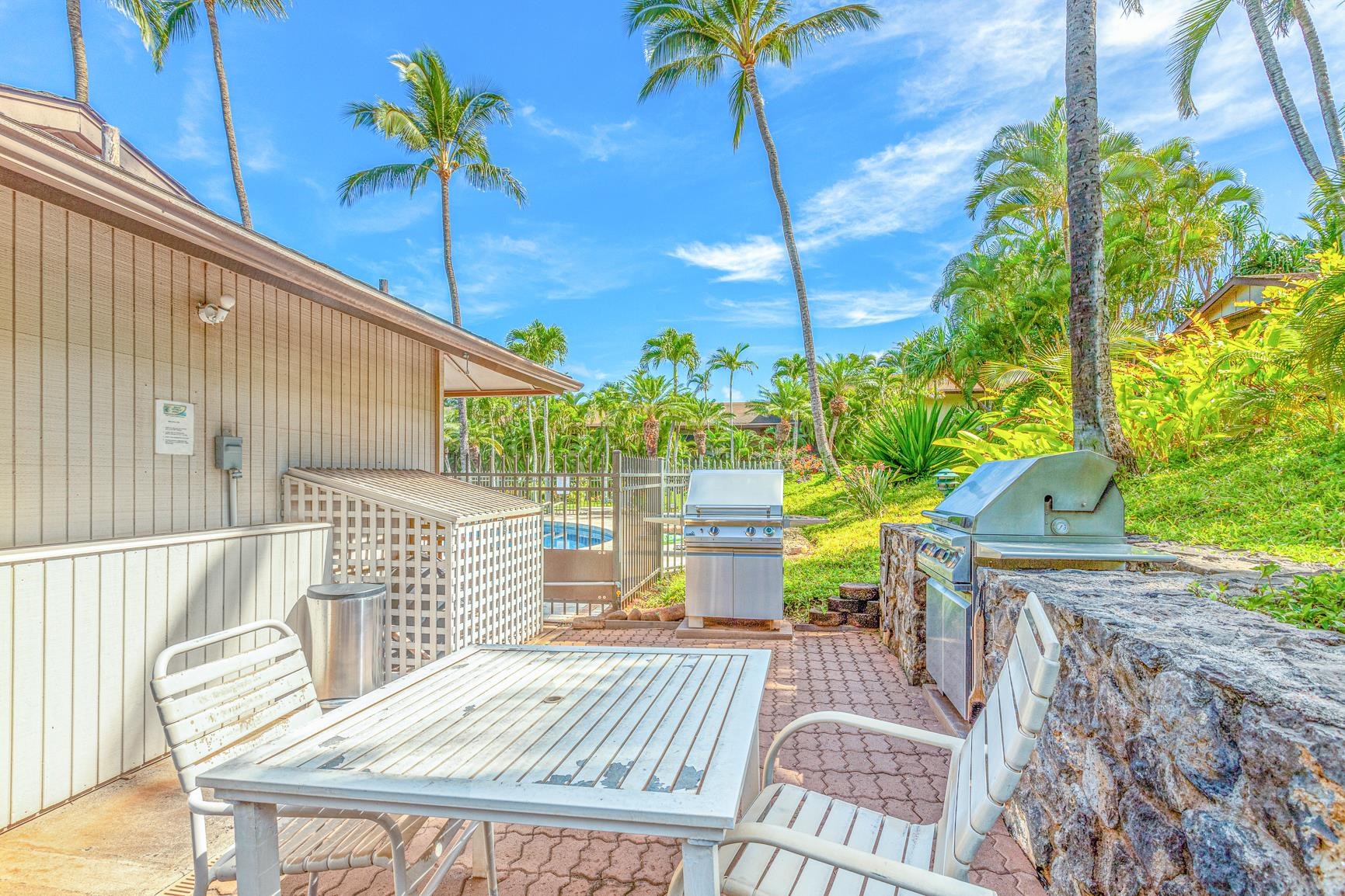 3788 Lower Honoapiilani Road, Unit D101 Lahaina, HI 96761 - Photo 22 of 40 a view of a chairs and table in patio