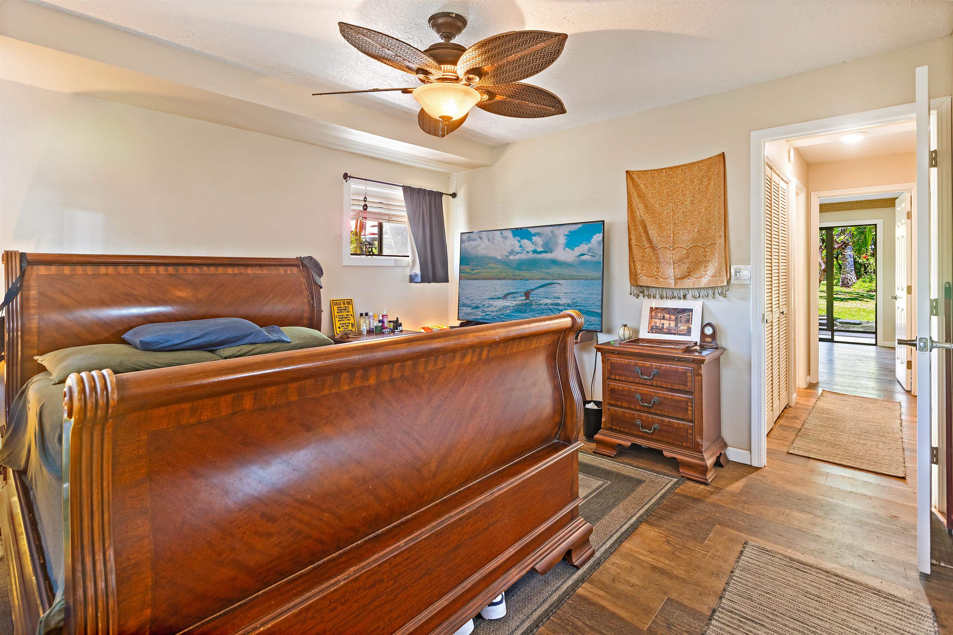 3788 Lower Honoapiilani Road, Unit D101 Lahaina, HI 96761 - Photo 28 of 40 a work room with furniture and a ceiling fan