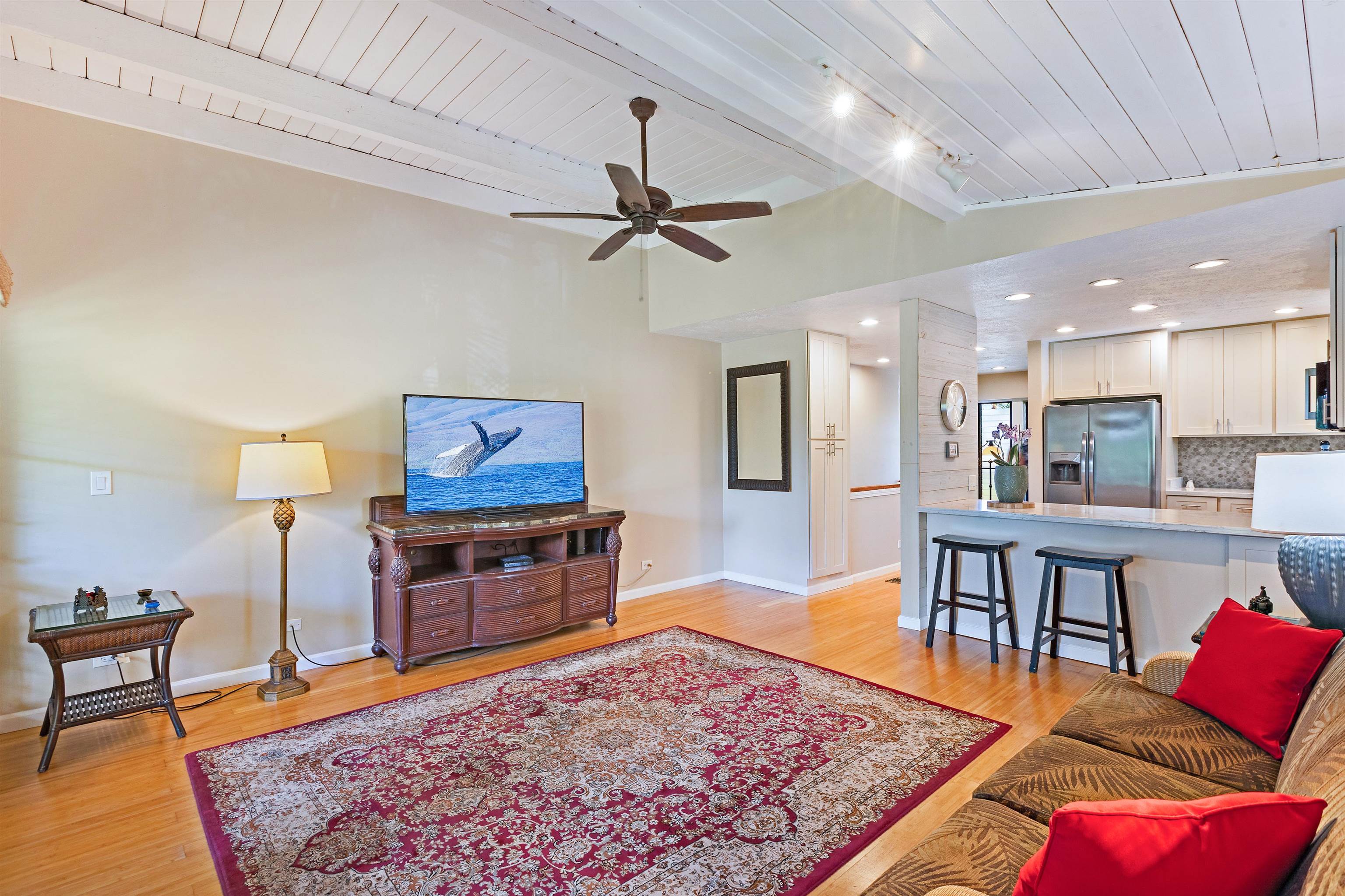 3788 Lower Honoapiilani Road, Unit D101 Lahaina, HI 96761 - Photo 6 of 40 a living room with furniture and a rug