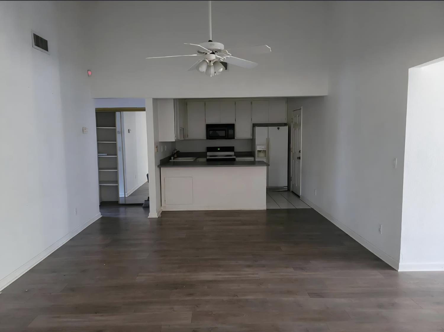 5151 Janell Way Carmichael, CA 95608 - Photo 4 of 15 a kitchen with a stove and a refrigerator