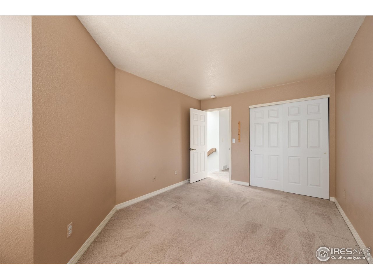 4500 Seneca Street, Unit 71 Fort Collins, CO 80526 - Photo 26 of 37 a view of an empty room and window