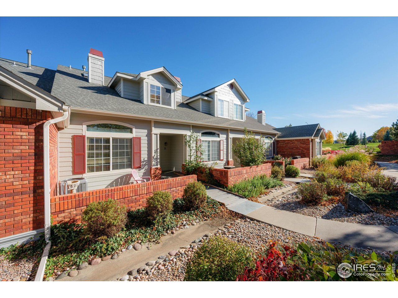 4500 Seneca Street, Unit 71 Fort Collins, CO 80526 - Photo 37 of 37 a front view of a house with a porch