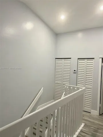 a view of a balcony with window