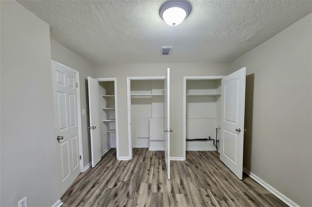 321 Tarragon Way Southwest Atlanta, GA 30331 - Photo 11 of 15 wooden floor in an empty room