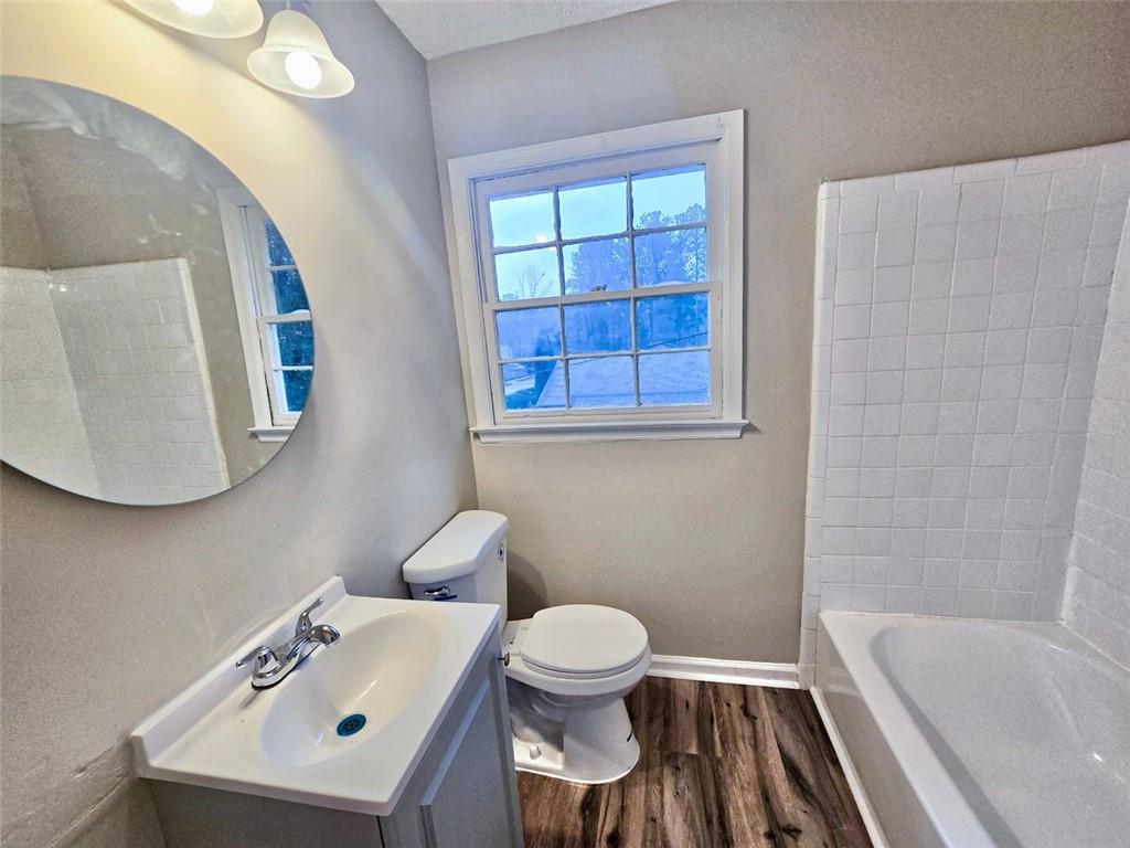 321 Tarragon Way Southwest Atlanta, GA 30331 - Photo 15 of 15 a bathroom with a sink and a mirror