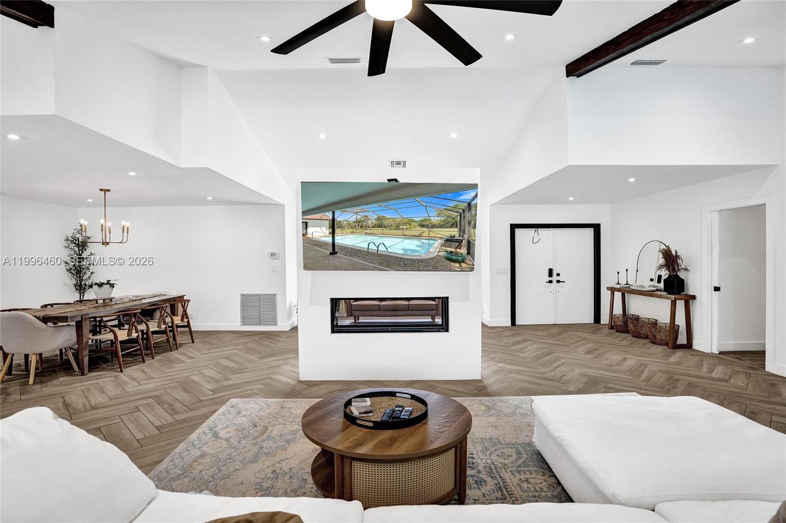 18428 102nd Way South Boca Raton, FL 33498 - Photo 32 of 70 a living room with furniture and a rug
