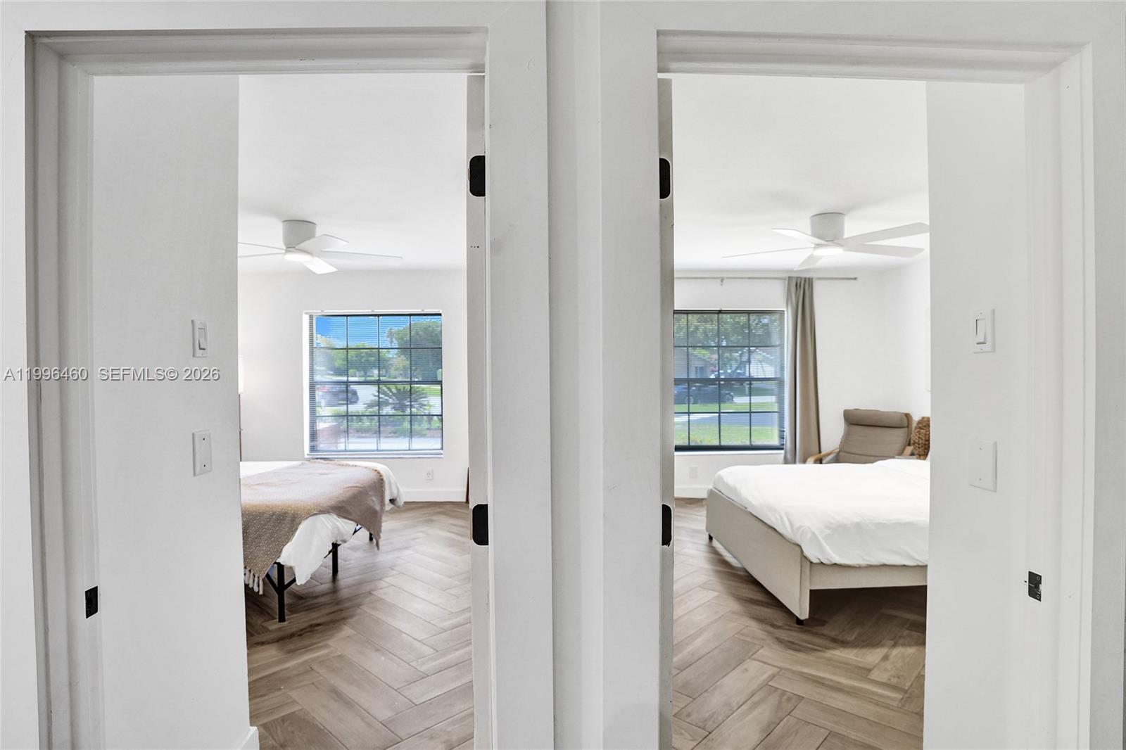 18428 102nd Way South Boca Raton, FL 33498 - Photo 44 of 70 a bedroom with a bed and a window