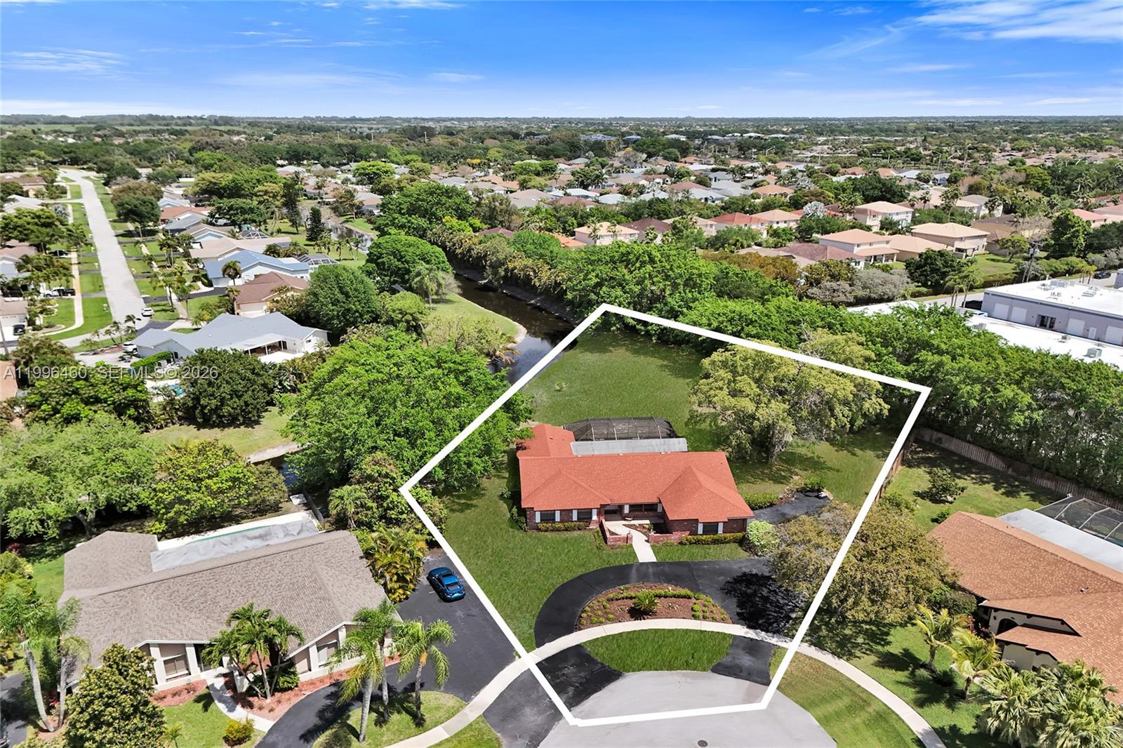18428 102nd Way South Boca Raton, FL 33498 - Photo 6 of 70 an aerial view of residential houses with outdoor space and trees
