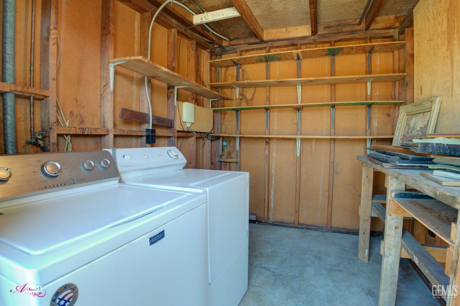 Undisclosed Address Bakersfield, CA 93309 - Photo 28 of 42 a utility room with dryer and washer