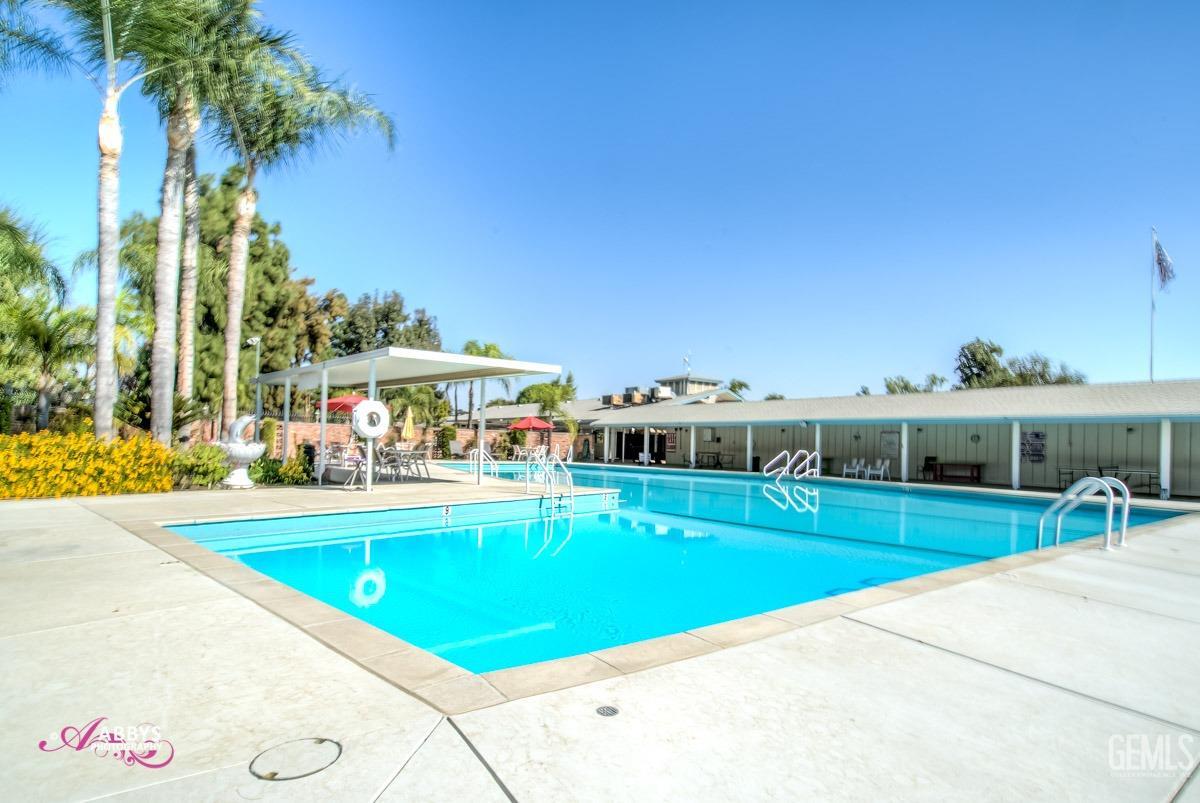 Undisclosed Address Bakersfield, CA 93309 - Photo 38 of 42 a view of a house with a swimming pool