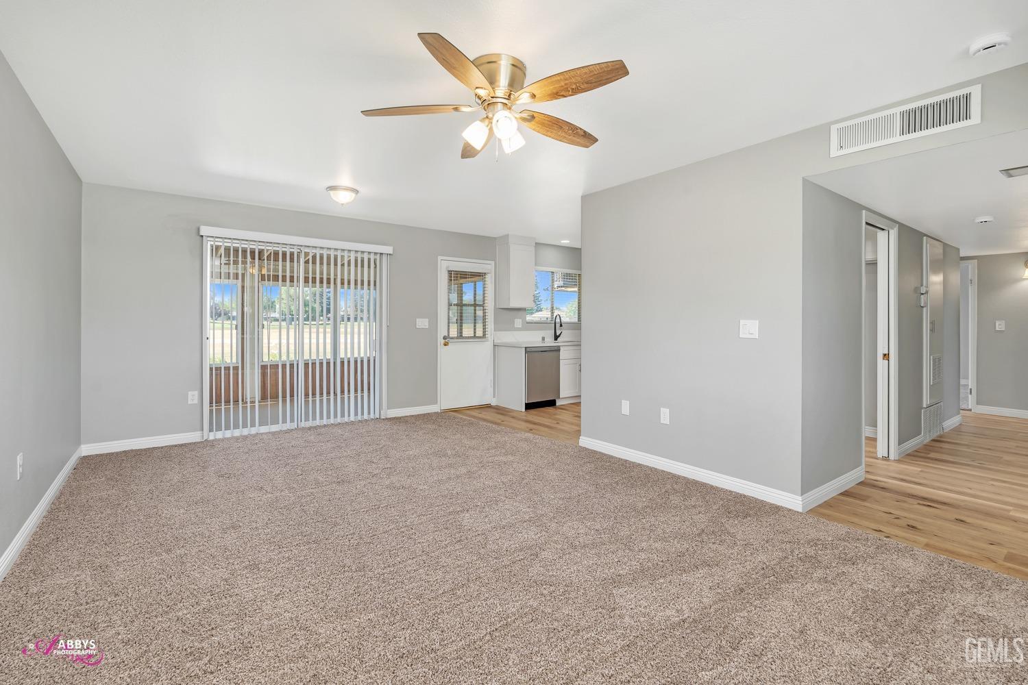 Undisclosed Address Bakersfield, CA 93309 - Photo 8 of 42 a view of an empty room with a window