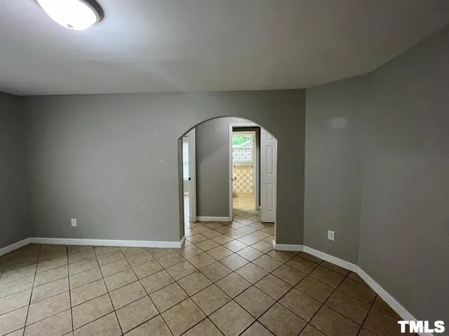 a view of an empty room with window