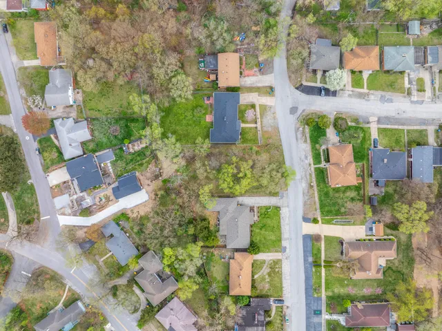 aerial view of residential houses with outdoor space