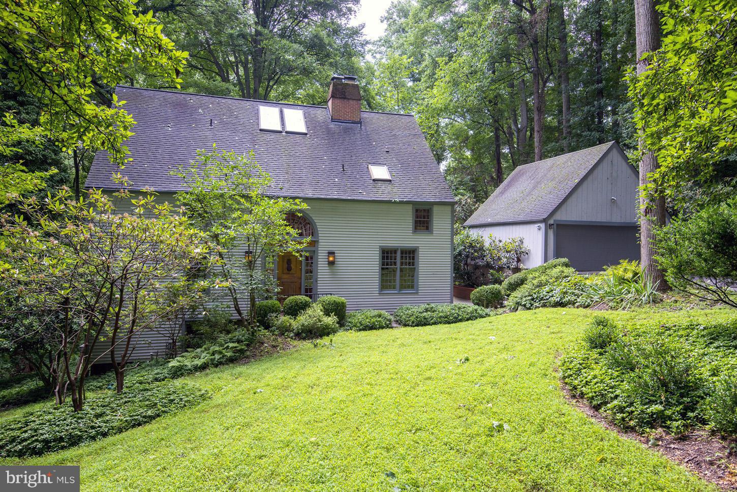 11545 Springridge Road Potomac, MD 20854 - Photo 1 of 30 a view of a house with a yard and plants