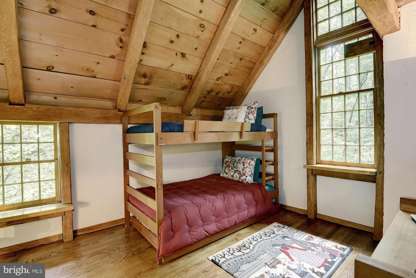 11545 Springridge Road Potomac, MD 20854 - Photo 18 of 30 a bed room with a bed and a window