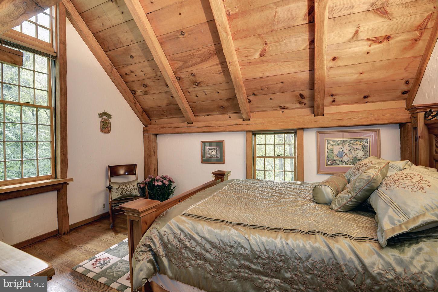 11545 Springridge Road Potomac, MD 20854 - Photo 20 of 30 a bedroom with a bed next to a window