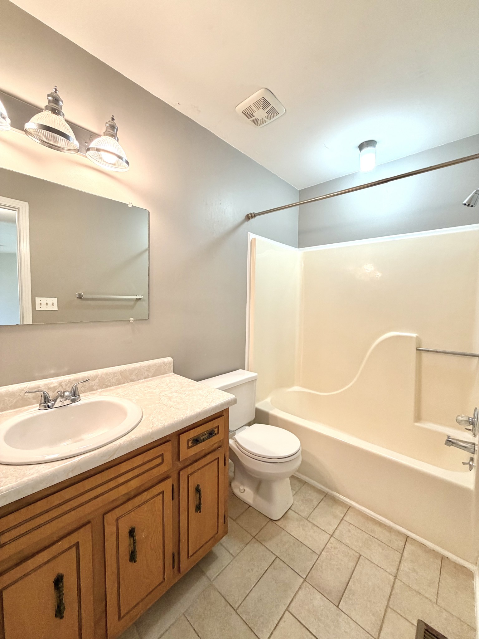 3411 Polly Drive Clarksville, TN 37042 - Photo 18 of 28 a bathroom with a granite countertop sink mirror vanity and toilet