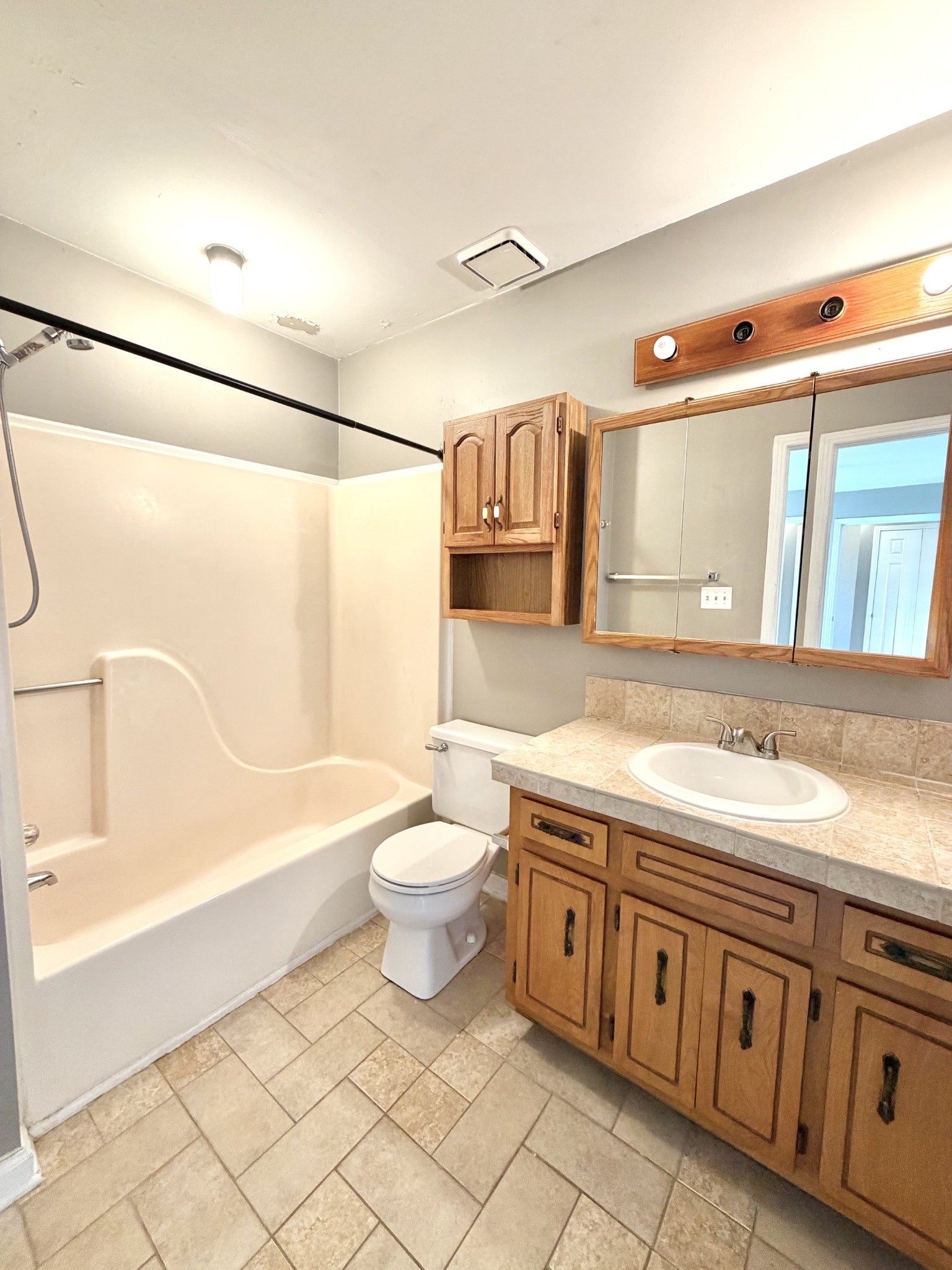 3411 Polly Drive Clarksville, TN 37042 - Photo 23 of 28 a bathroom with a granite countertop sink toilet and shower