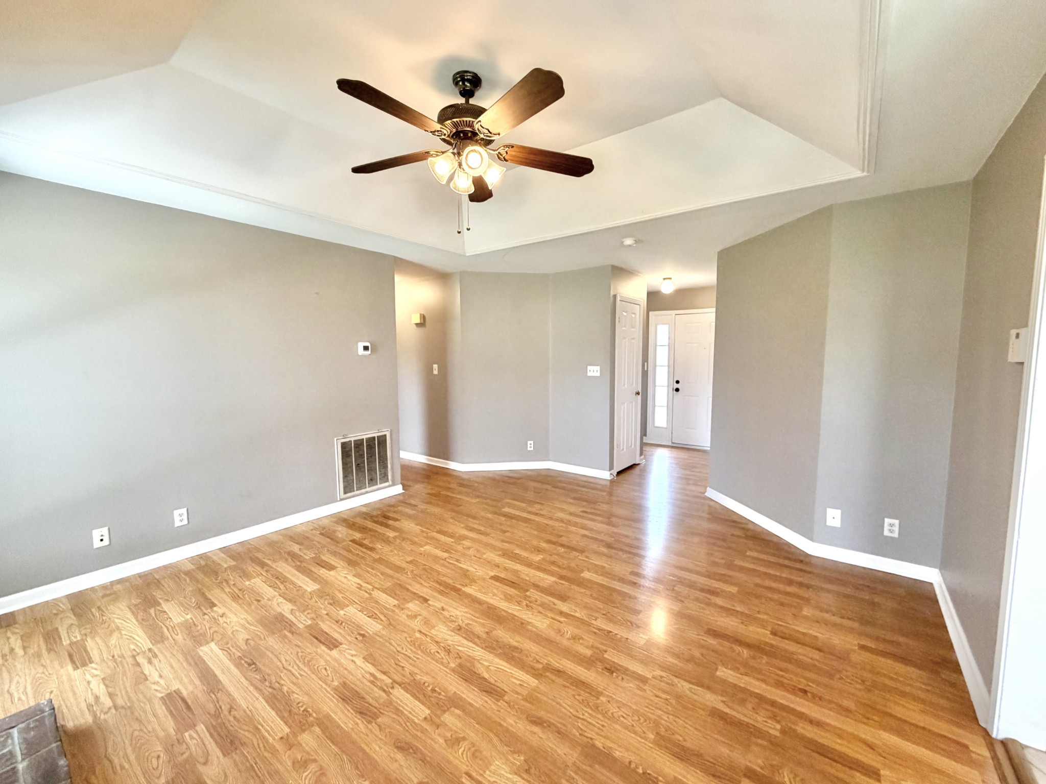 3411 Polly Drive Clarksville, TN 37042 - Photo 6 of 28 a view of an empty room with wooden floor