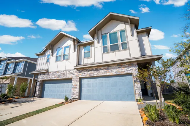a view of a white building among the street