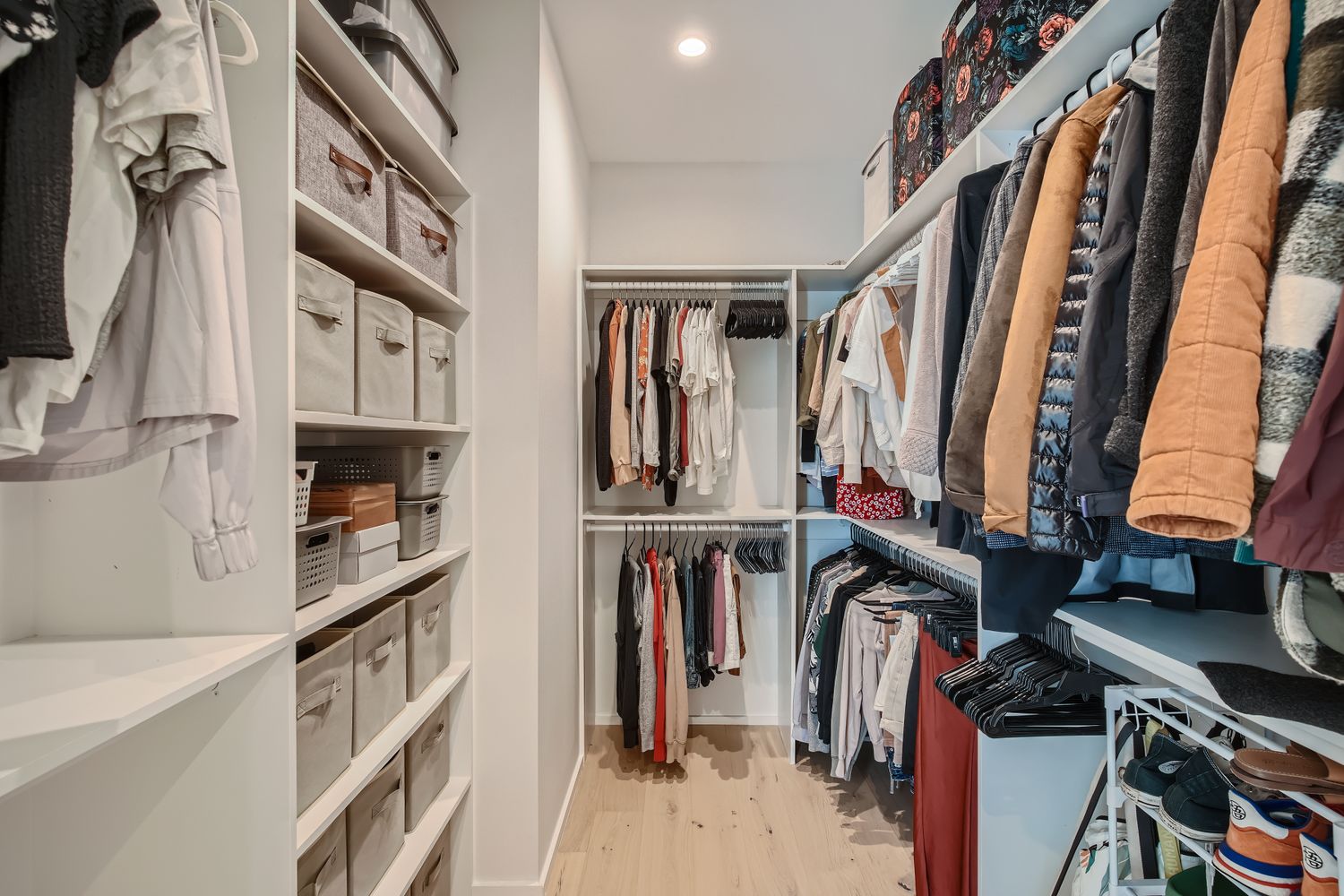 7525 Delafield Lane, Unit A Austin, TX 78752 - Photo 19 of 33 a view of walk in closet with clothes and shoes