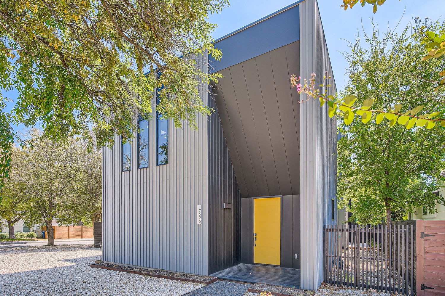 7525 Delafield Lane, Unit A Austin, TX 78752 - Photo 2 of 33 front view of a house with a tree