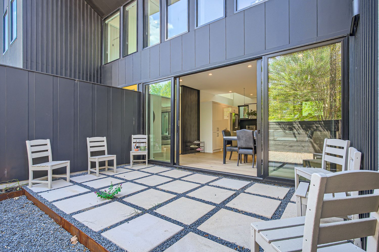 7525 Delafield Lane, Unit A Austin, TX 78752 - Photo 30 of 33 a living room with furniture a flat screen tv and a table