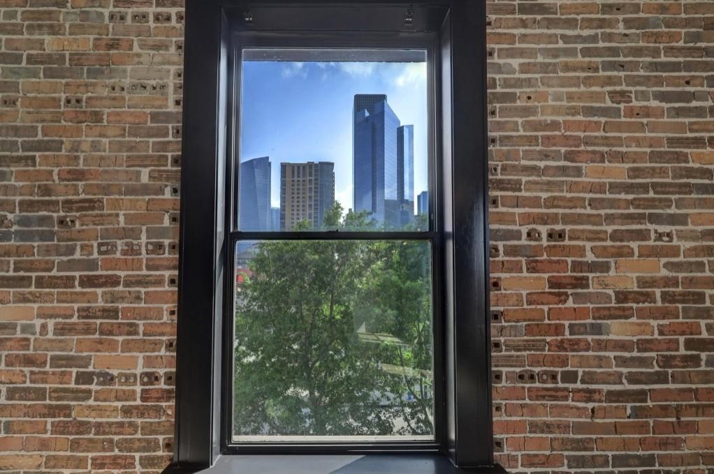 915 Franklin Street, Unit 2F Houston, TX 77002 - Photo 23 of 50 a view of a brick wall